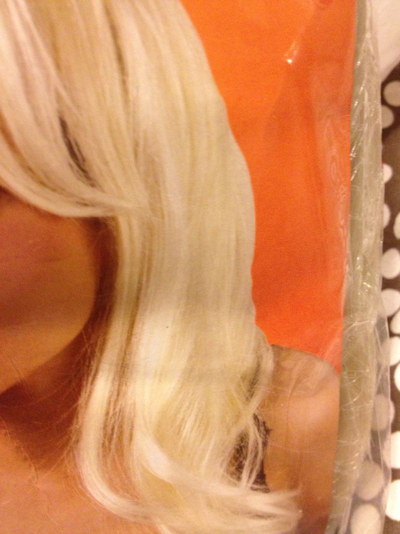 blonde, modeled by a latina